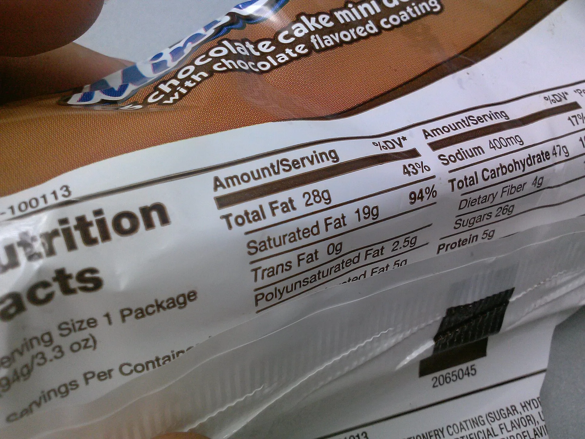 A w:Nutrition Facts label on a fatty candy confection. What US packaged food labels must show for nutrition, allergens, ingredients and net weight