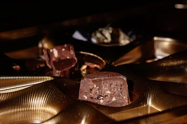 chocolates, chocolate, dessert, packaging, gold, box, nibble, calories, cute, nuts, sweets, confectionery, enjoyment, unhealthy, confiserie, chocolatier, cocoa, gourmet, specialty, whole milk. Specialty food packages customers actually buy